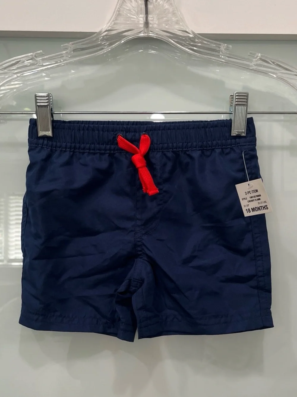 First Impressions Navy blue kids swim shorts with red drawstring, Size 18 months
